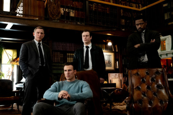 Daniel Craig, Chris Evans, Noah Segan and LaKeith Stanfield star in a scene from the movie "Knives Out." (CNS photo/Lionsgate)