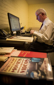 John Mulderig poses for a photo Sept. 13, 2019, in Catholic News Service's New York bureau, where he serves as assistant director for media reviews. The CNS Media Review Office evolved from the National Catholic Office for Motion Pictures. (CNS photo/Chaz Muth) 