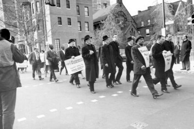 Archdiocese of Baltimore priests participate in a march for fair housing